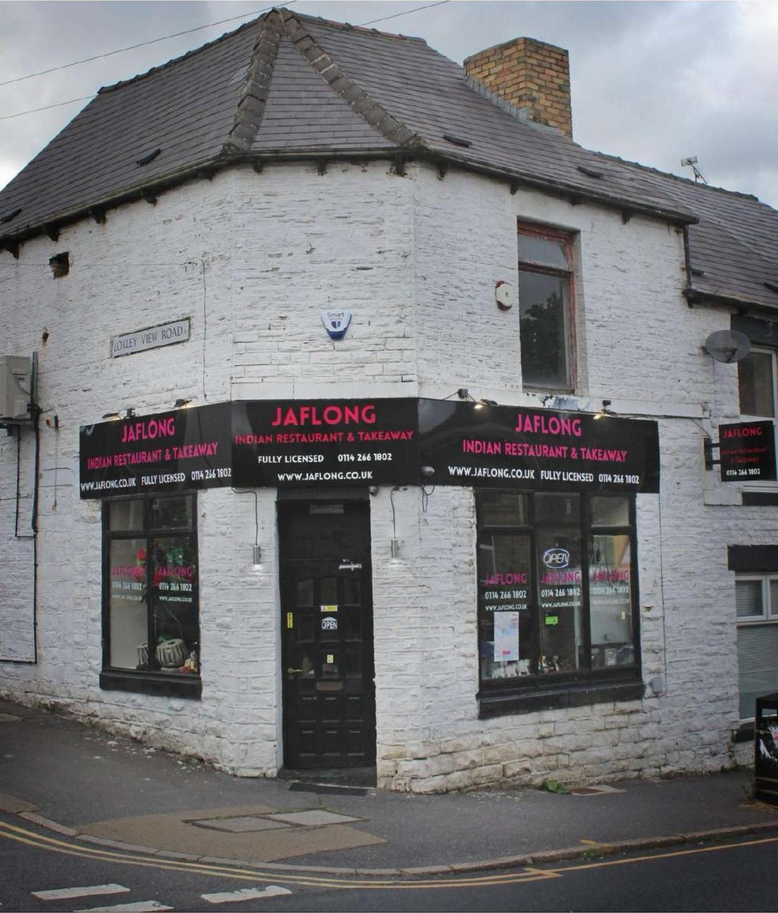 Jaflong Indian Restaurant & Takeaway exterior on Loxley View Road corner in daylight